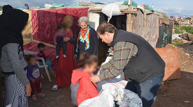 ihtiyaç sahibi çocuklara bot ve mont yardımı
