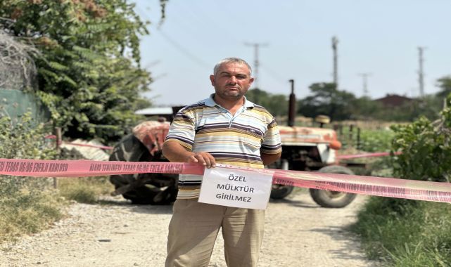 Tapulu arazisindeki yola &#039;özel mülk&#039; yazısı asıp, ulaşıma kapattı