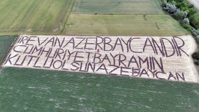 Azerbaycan'ın bağımsızlık gününü tarlasına yazdığı yazıyla kutladı
