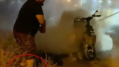 Motosikletteki yangına kırık bacağıyla müdahale etti; o anlar kamerada