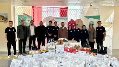 Üniversitelilerden ihtiyaç sahibi ilkokul öğrenicilerine bot ve mont desteği